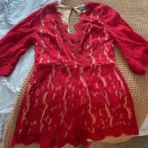 Beautiful red lace romper. Longsleeve